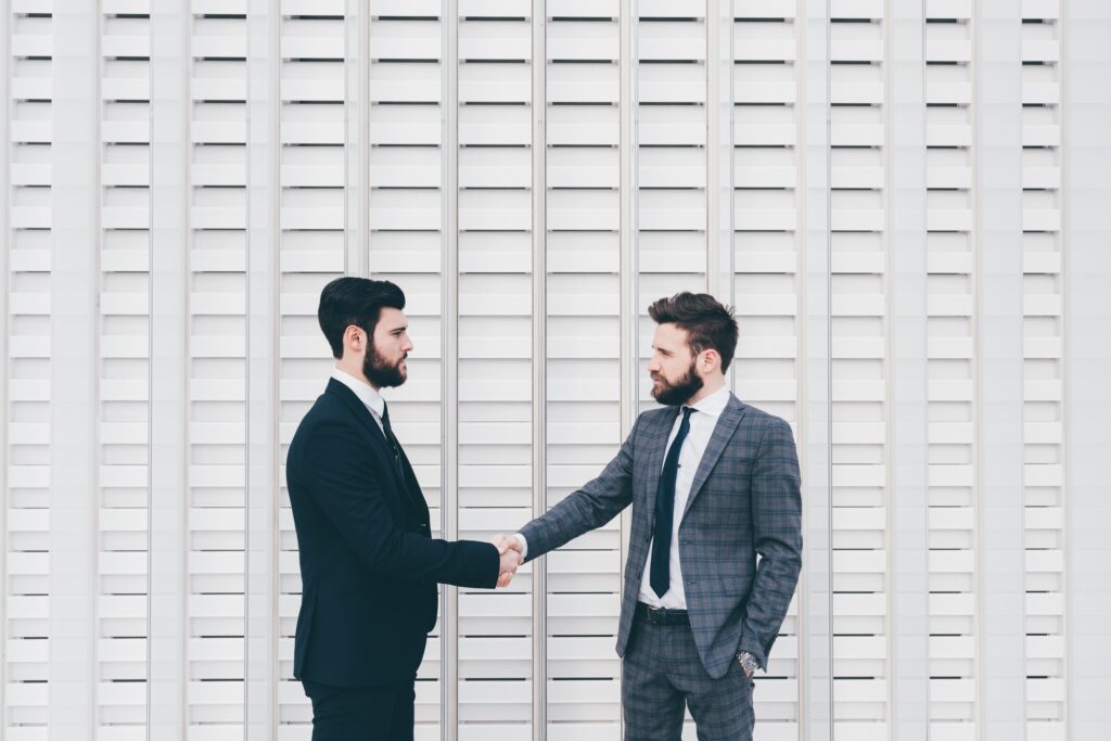 Business handshake agreement partnership